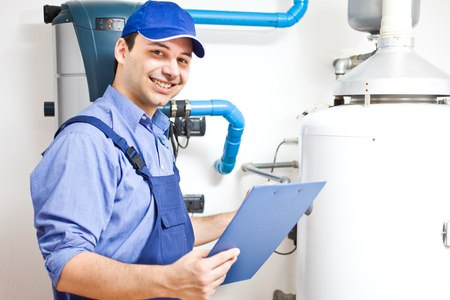 Technician servicing an hot-water heater